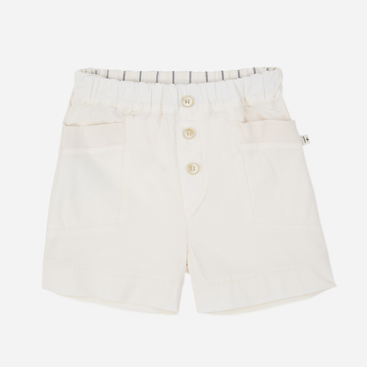 Sold at Bombon Shop, designed by 1+ in the family, off-white baby bermuda shorts with front button detail and soft cotton fabric.