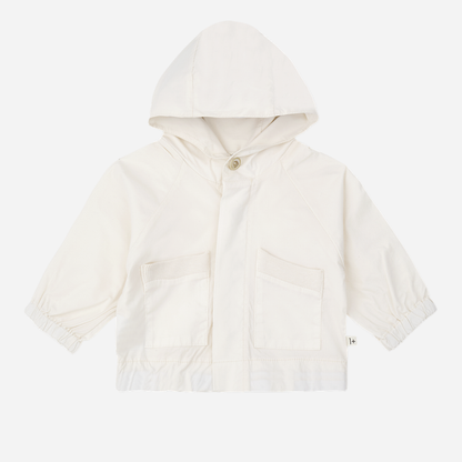 Sold at Bombon Shop, designed by 1+ in the family, off-white baby hooded jacket with front pockets and soft cotton fabric.