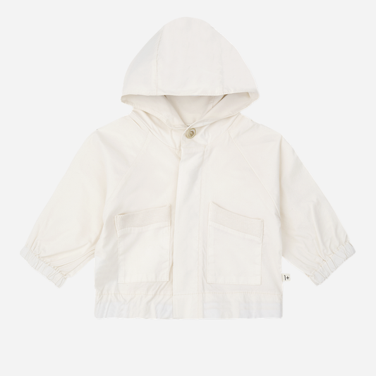 Sold at Bombon Shop, designed by 1+ in the family, off-white baby hooded jacket with front pockets and soft cotton fabric.