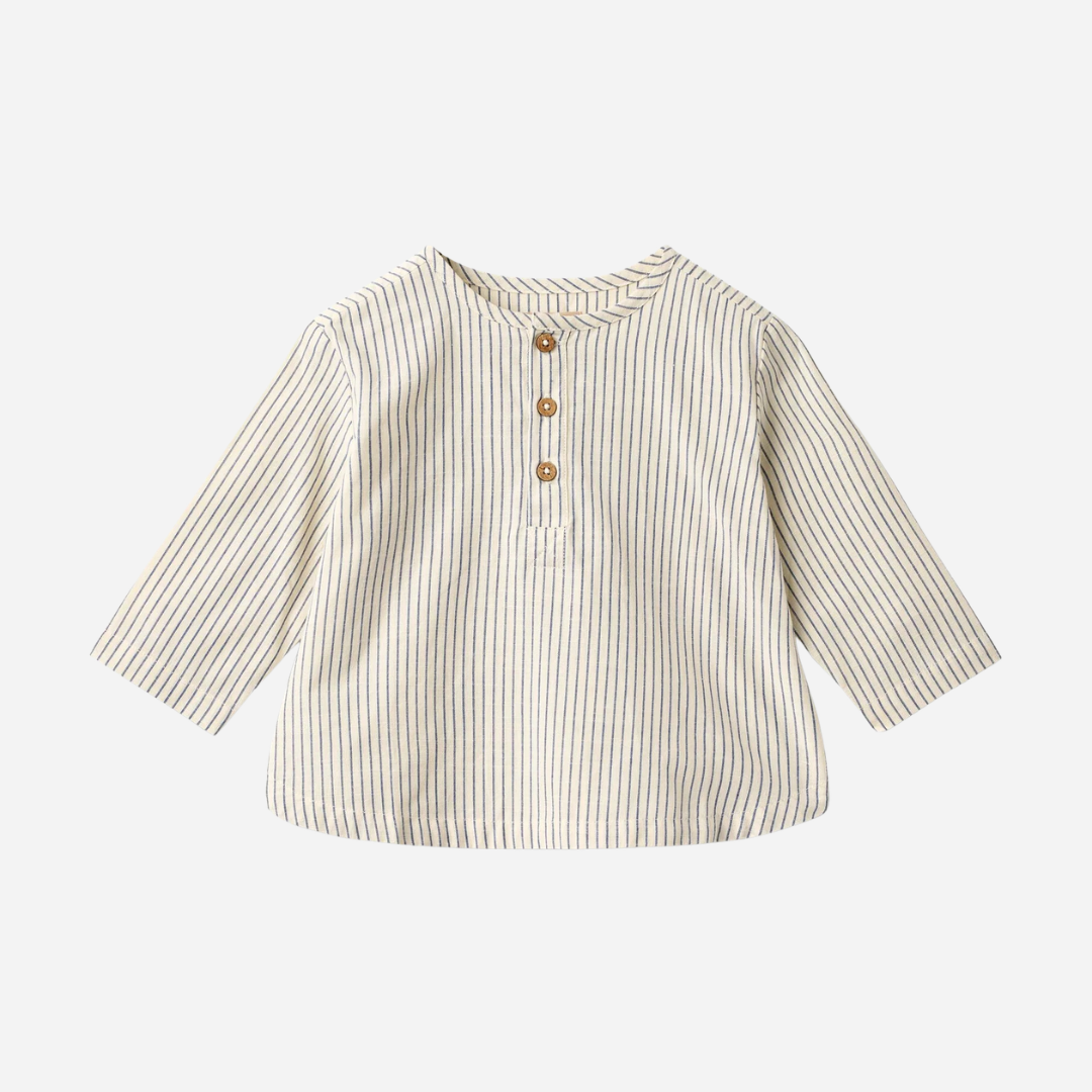 Sold at Bombon Shop, designed by Wheat, blue stripe organic cotton kids long sleeve button-down shirt with vertical blue stripes.