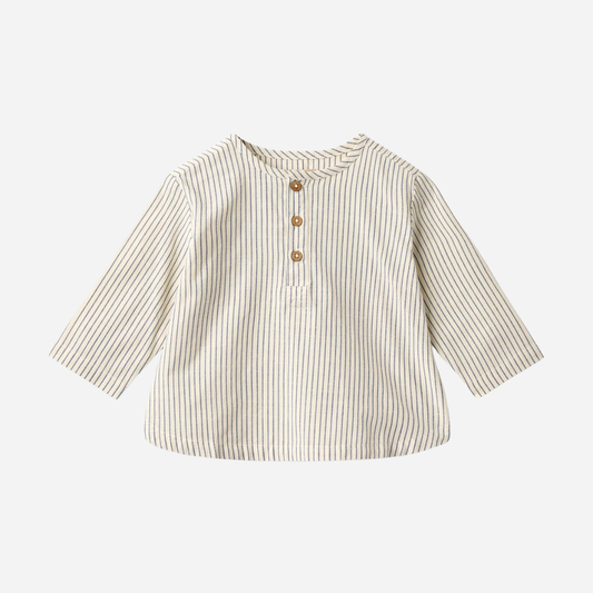 Sold at Bombon Shop, designed by Wheat, blue stripe organic cotton kids long sleeve button-down shirt with vertical blue stripes.