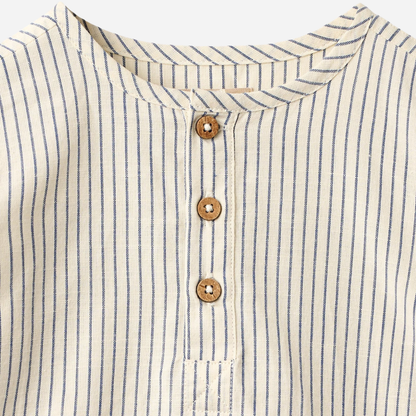 Sold at Bombon Shop, designed by Wheat, blue stripe organic cotton kids long sleeve button-down shirt with vertical blue stripes.