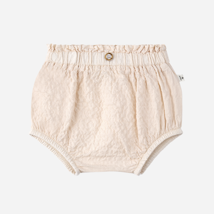 Sold at Bombon Shop, designed by 1+ in the family, blossom pink baby blouse with flutter sleeves and matching bloomers in textured cotton fabric.