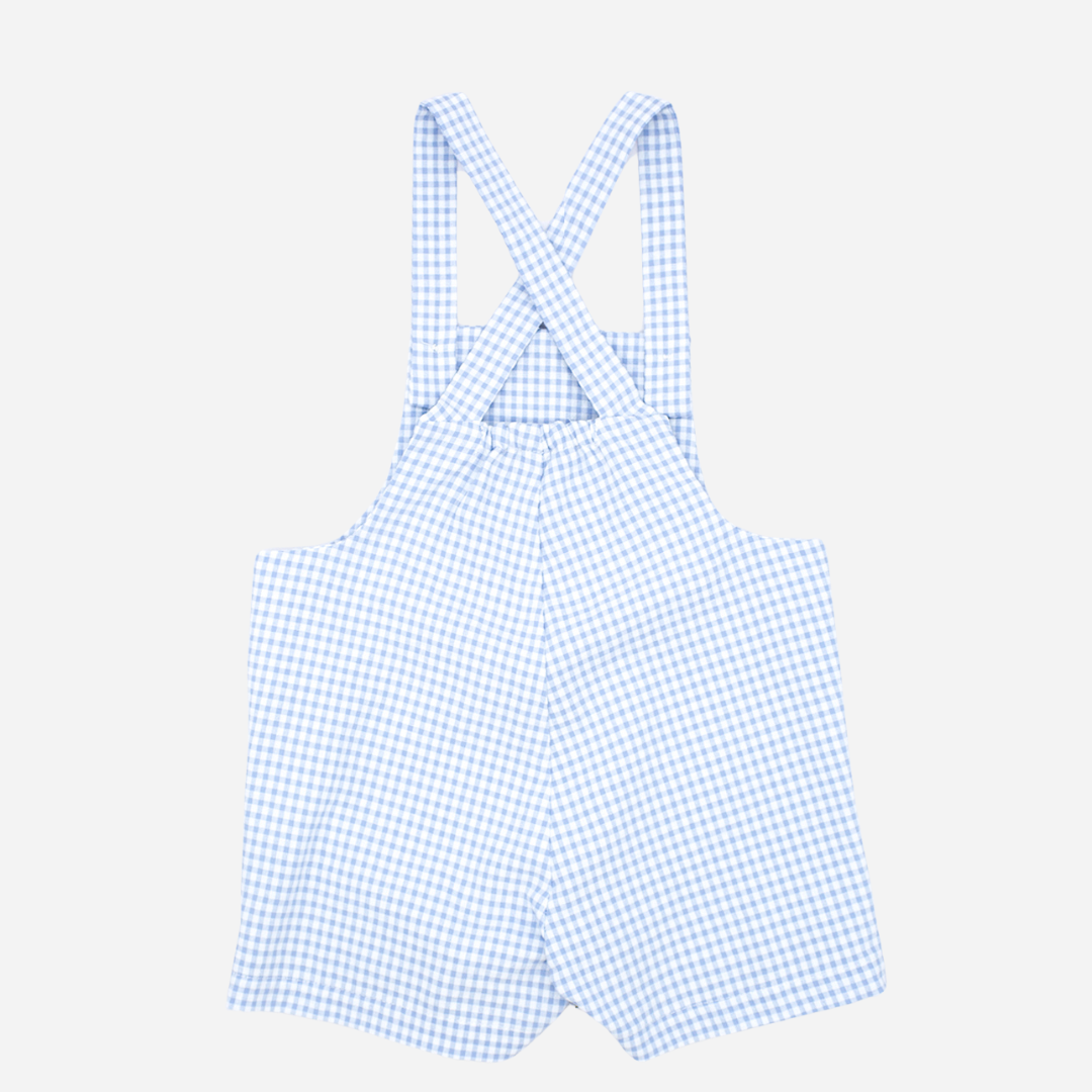 Sold at Bombon shop, designed by Fina Ejerique brand, blue gingham baby overalls perfect for spring and summer. Back view