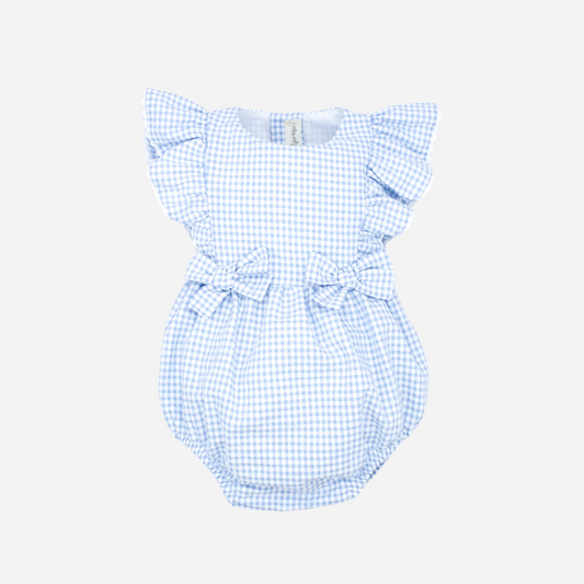 Sold in Bombon shop, designed by Fina Ejerique brand a gingham blue ruffle baby romper ideal for spring and summer. Front view
