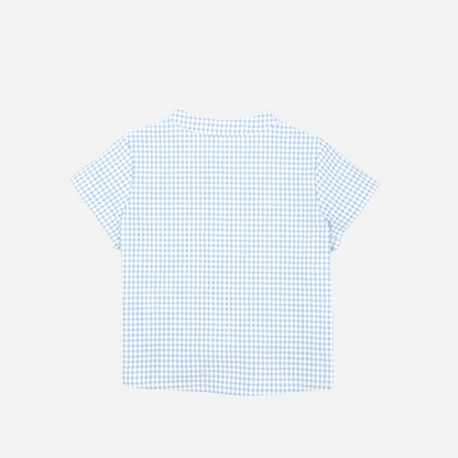 Sold at Bombon, designed by Fina Ejerique brand, a blue gingham shirt for babies and toddlers perfect for spring and summer. Back view 