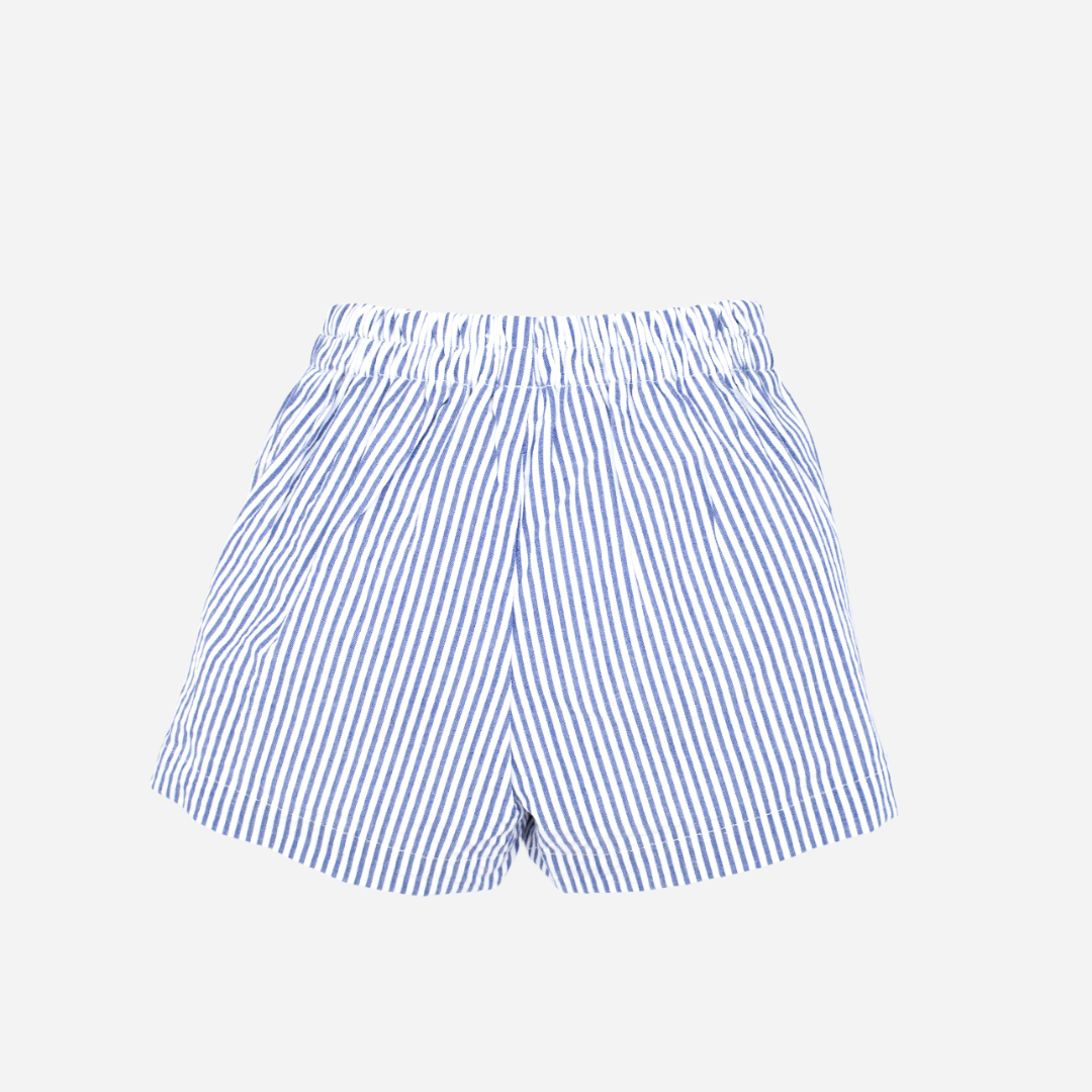 Sold at Bombon shop, designed by Fina Ejerique brand, blue striped bermuda shorts for babies and toddlers perfect for summer and spring. Back view