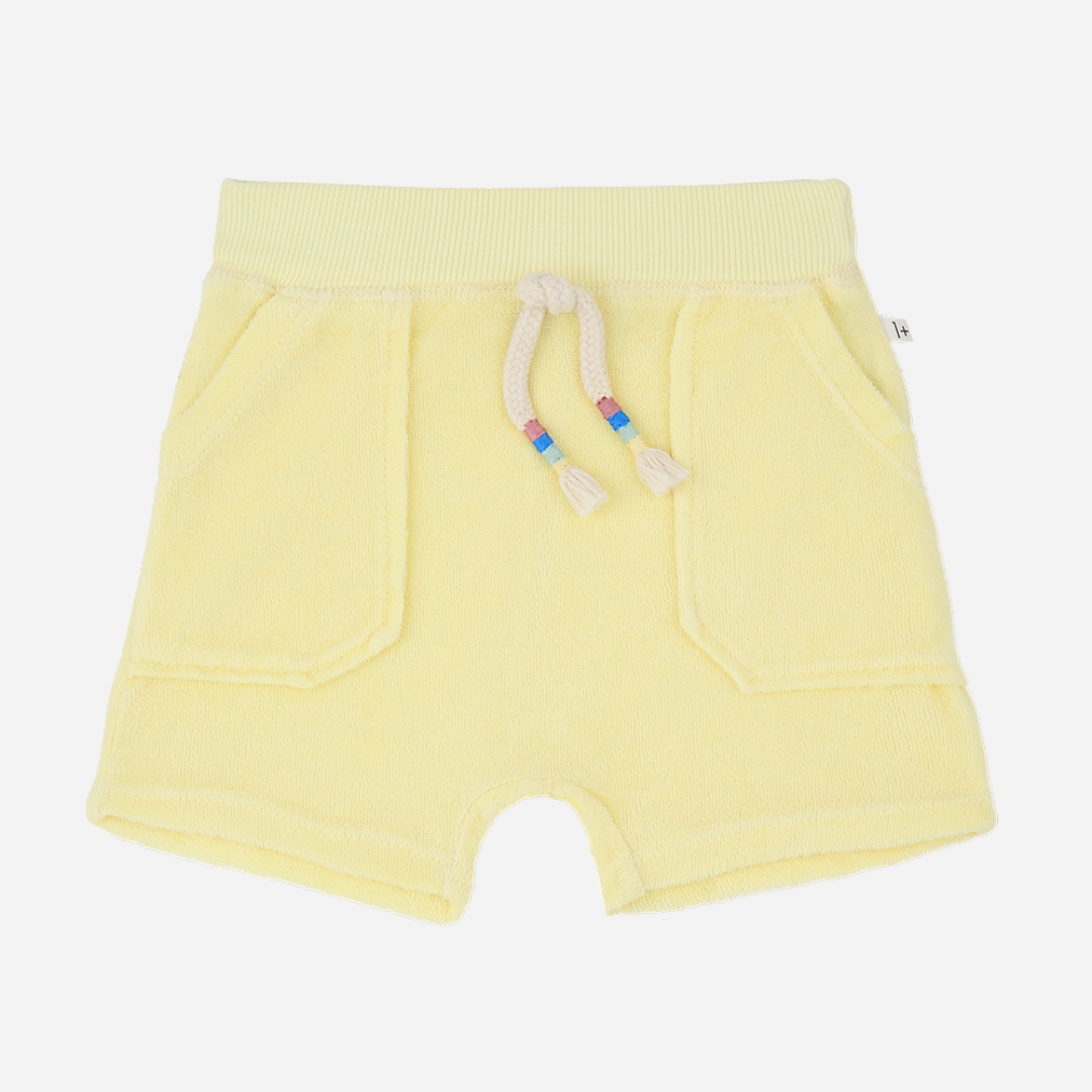 Sold at Bombon Shop, designed by 1+ in the family, lemon baby bermuda shorts with drawstring waistband and soft cotton fabric.