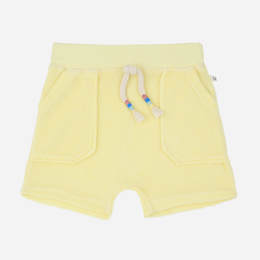 Sold at Bombon Shop, designed by 1+ in the family, lemon baby bermuda shorts with drawstring waistband and soft cotton fabric.