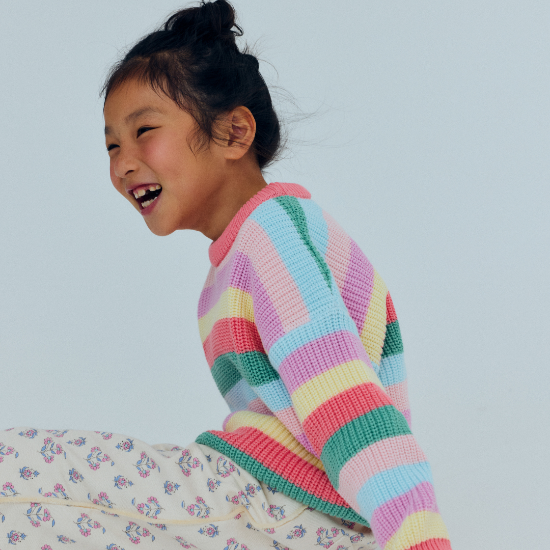sold at Bombon, designed by The New Society kids jumper in flamingo pink multicolor stripes in 100% organic cotton matching shorts and sibling set
