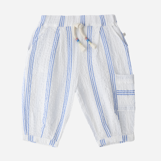 Sold at Bombon Shop, designed by 1+ in the family, ultramarine striped baby pants with elastic waistband and soft cotton fabric.