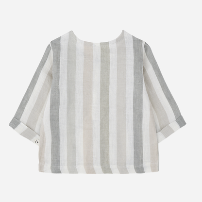 Sold at Bombon Shop, designed by 1+ in the family, beige striped baby shirt with lightweight cotton fabric and relaxed summer fit.