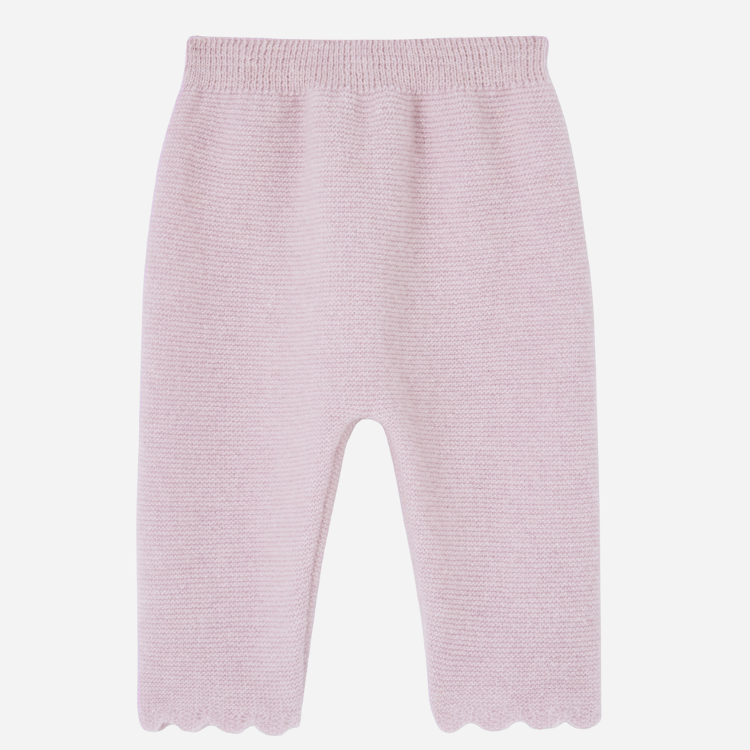 Sold at Bombon shop, designed by Paz Rodriguez, light pink knit baby pants with scalloped hems and elastic waistband. Matches perfectly with coordinating top, hat, and blanket.
