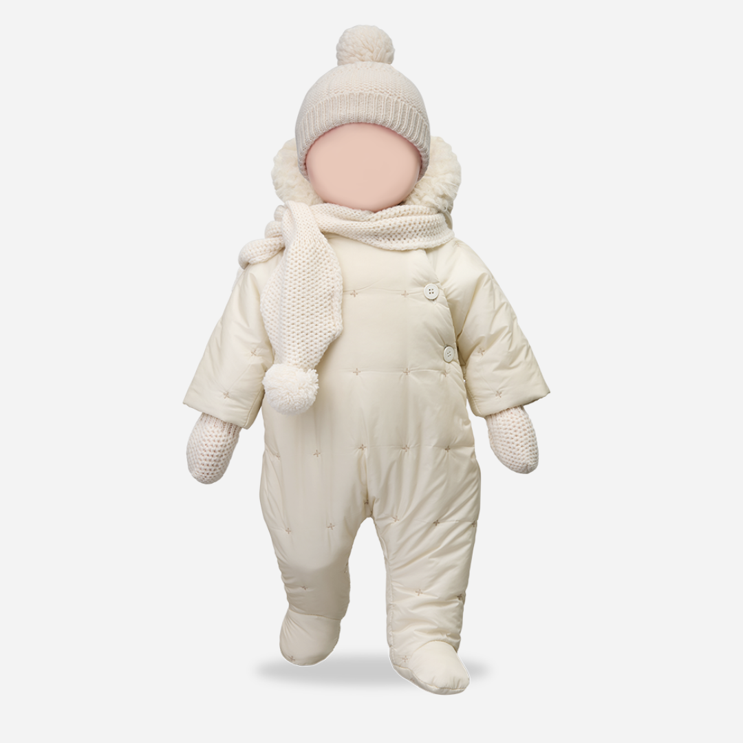 Sold at Bombon shop, designed by 1+ in the family — ecru padded baby snowsuit with star quilting, sherpa-lined hood, and front button closures, displayed flat on a white background. mannequin