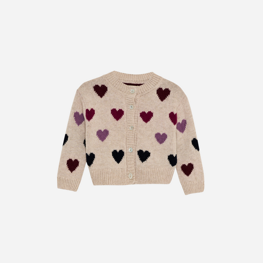 Sold at Bombon Shop, this baby girl cardigan by The New Society features a soft beige knit with multicolor heart motifs and front button closure. front