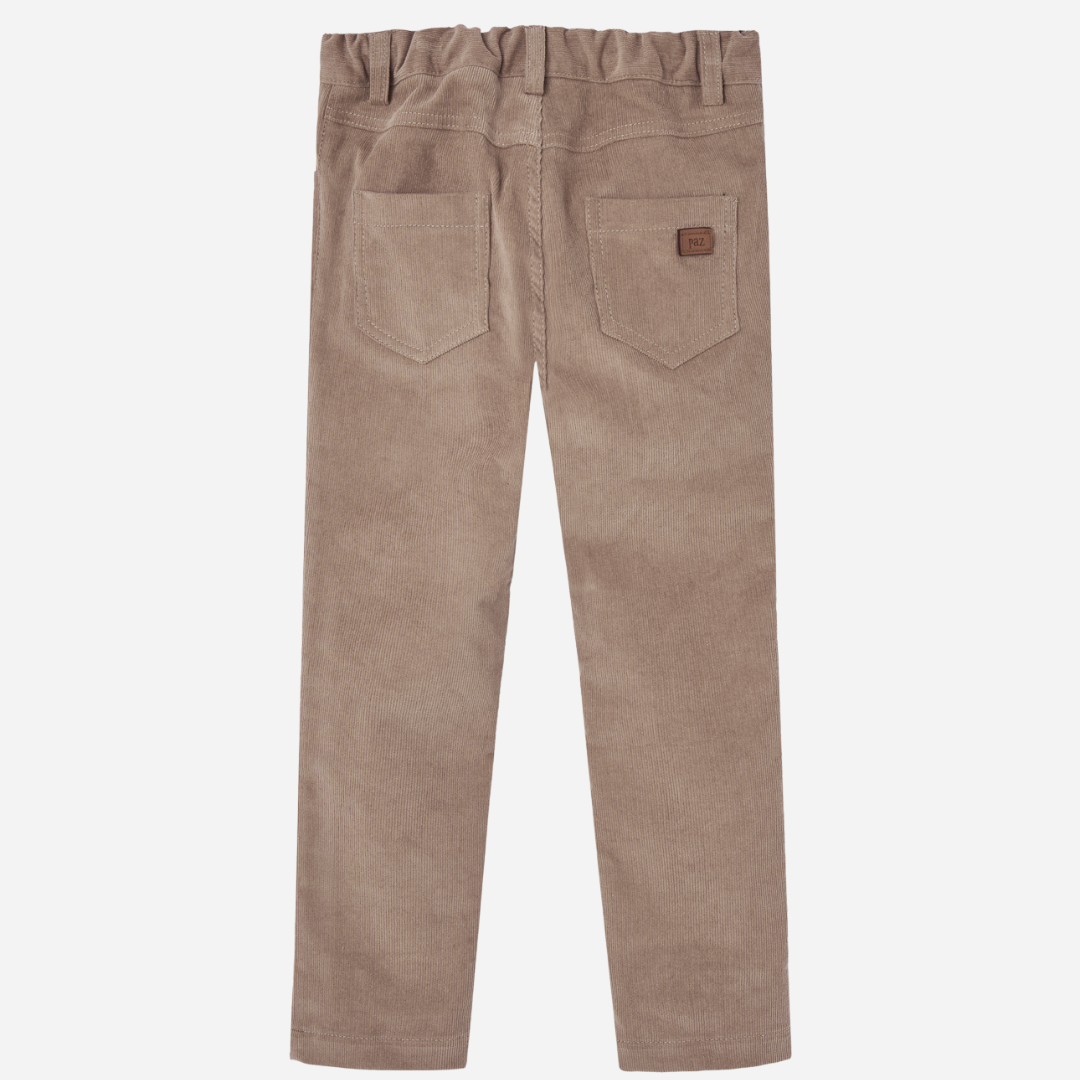 Sold at Bombon shop, designed by Paz Rodriguez: front view of children's taupe corduroy pants with elastic waistband and front button. back