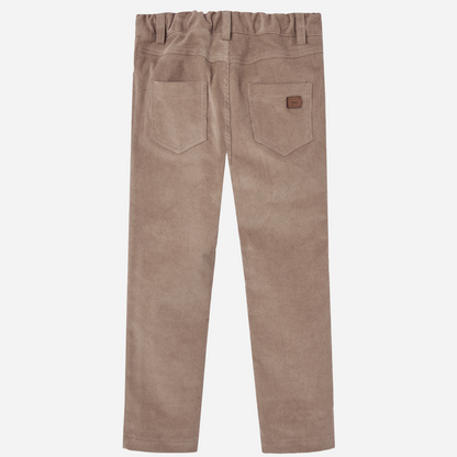 Sold at Bombon shop, designed by Paz Rodriguez: front view of children's taupe corduroy pants with elastic waistband and front button. back