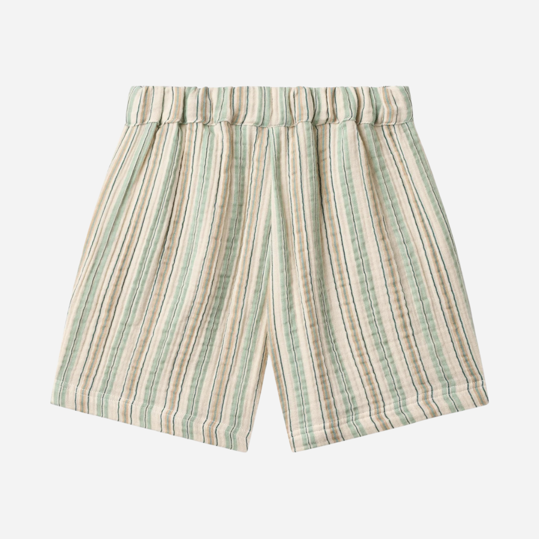 Sold at Bombon Shop, designed by Wheat, summer stripe organic cotton kids shorts with vertical striped pattern and elastic waistband.