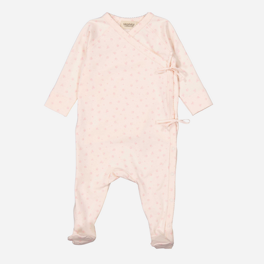 Sold at Bombon shop, designed by Mar Mar Copenhagen brand, this soft jumpsuit with feet in a cute floral print for baby girls is perfect for any occasion.