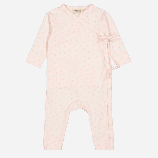 Sold at Bombon shop, designed by Mar Mar Copenhagen brand, this soft jumpsuit in a cute floral print for baby girls is perfect for any occasion.
