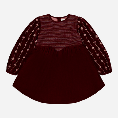 sold at Bombon shop, designed by Bachaa Paris, Dress, Velvet in Burgundy color, Plain lining in organic cotton voile, Fully hand embroidered sleeves with a golden thread, Smocked front, Gathered at the front and back, Golden buttons at the back. front view