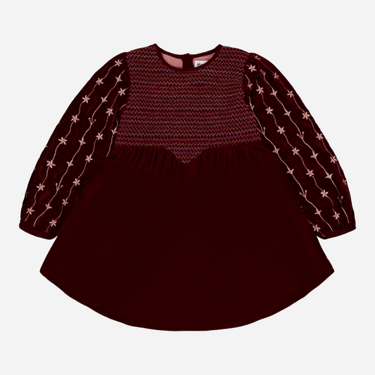 sold at Bombon shop, designed by Bachaa Paris, Dress, Velvet in Burgundy color, Plain lining in organic cotton voile, Fully hand embroidered sleeves with a golden thread, Smocked front, Gathered at the front and back, Golden buttons at the back. front view