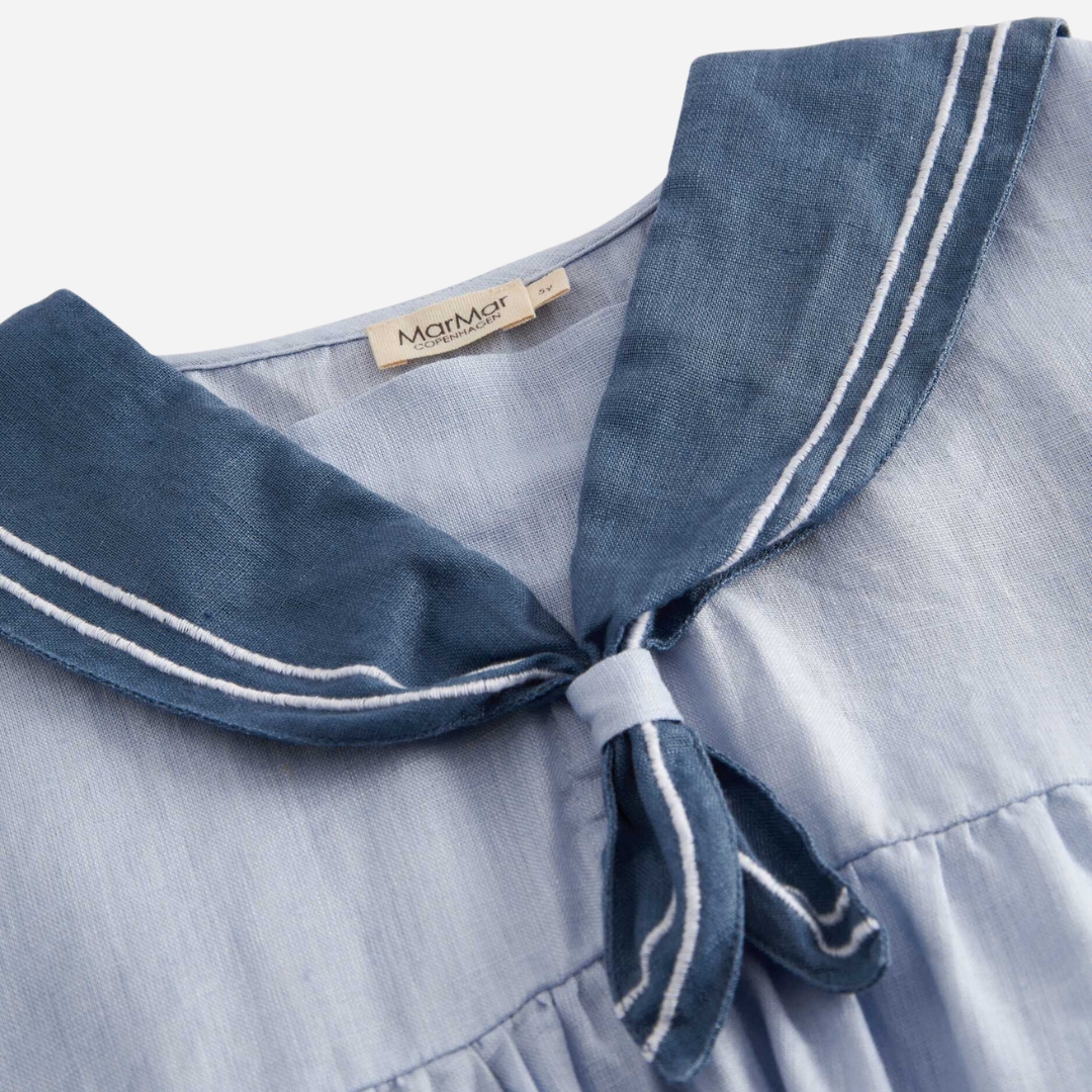 Sold at Bombon shop, designed by Mar Mar Copenhagen, Daki baby dress in Blue Mist linen with sailor collar