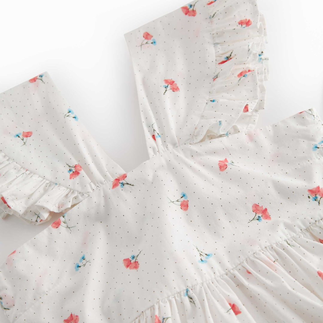 Sold at Bombon shop, designed by Mar Mar Copenhagen, Dalani children’s dress in Poppy print with ruffled straps