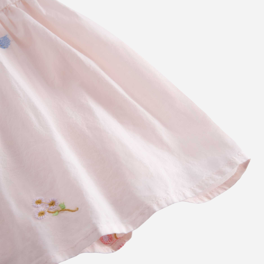 Sold at Bombon shop, designed by Mar Mar Copenhagen, Dalino baby dress in Summer Embroidery with ruffled collar