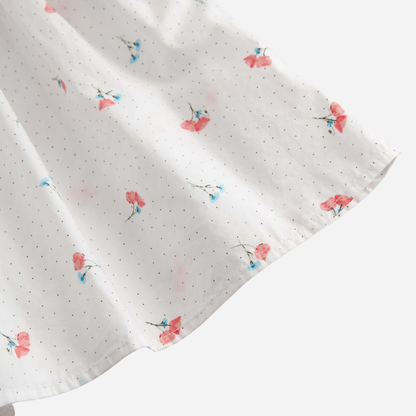 Sold at Bombon shop, designed by Mar Mar Copenhagen, Dalino baby dress in Poppy print with ruffled collar