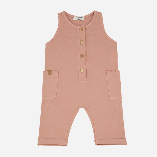Sold at Bombon shop, designed by 1+ in the family brand, this coral jumpsuit for baby girls and toddlers is perfect for spring and summer. Front view
