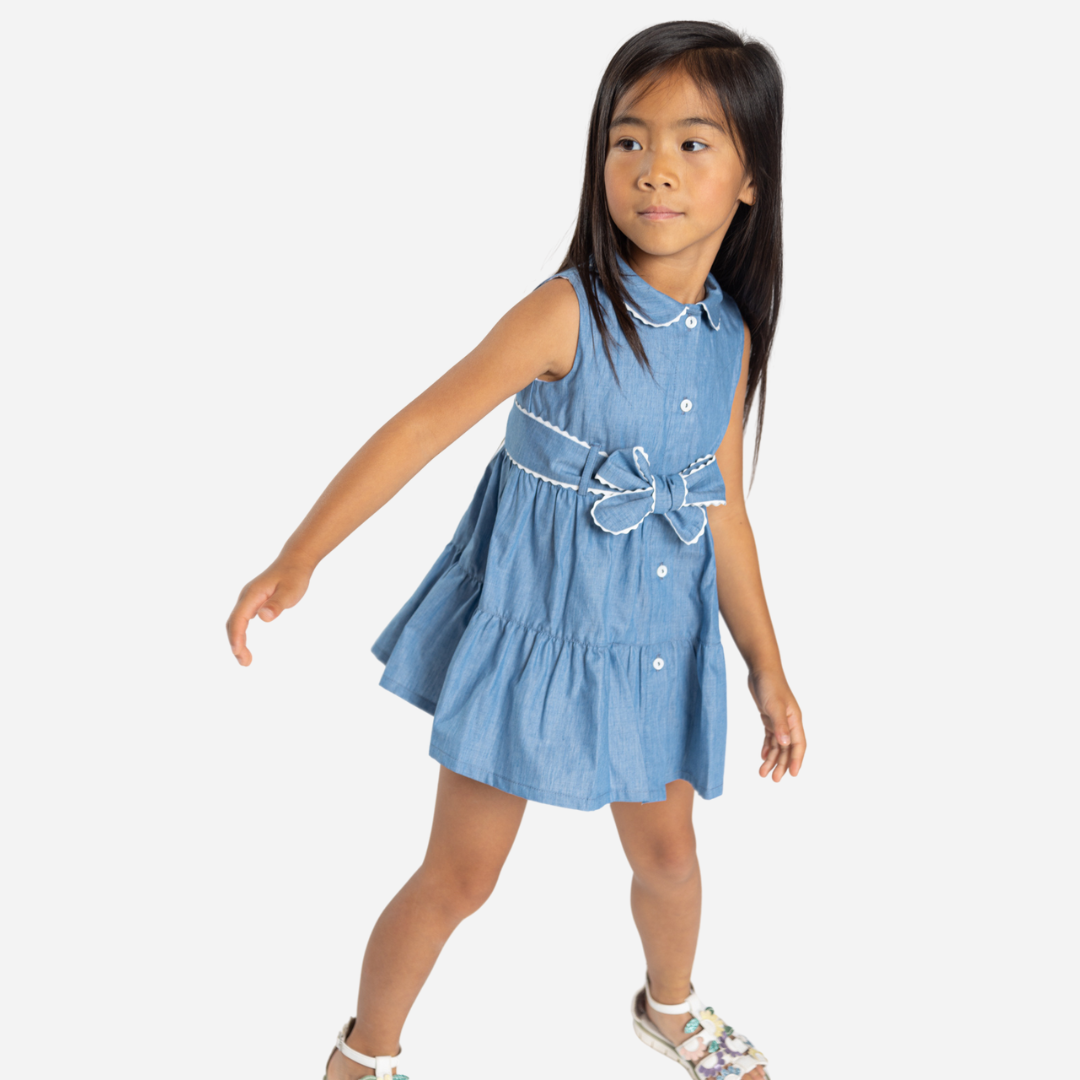 sold at Bombon shop, designed by Fina Ejerique brand, denim shirt dress for toddlers is perfect for spring and summer. model view