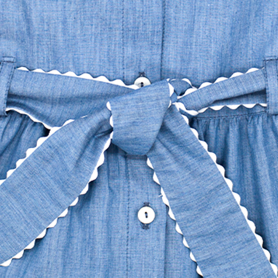 sold at Bombon shop, designed by Fina Ejerique brand, denim shirt dress for toddlers is perfect for spring and summer. zoom view