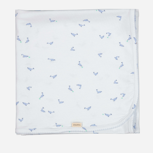 Sold at Bombon shop, designed by Mar Mar Copenhagen brand, this soft blanket in a cute dolphin print for baby boys is perfect for any occasion.