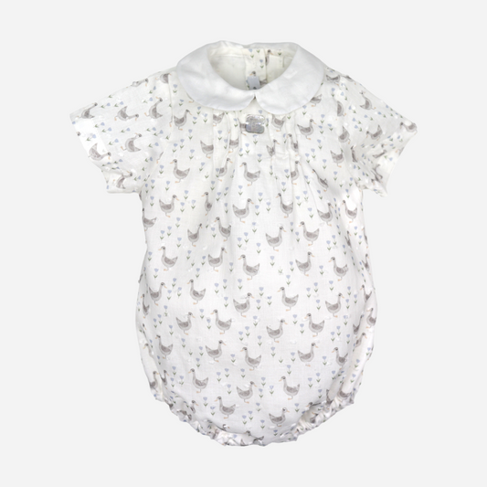 sold at Bombon shop, designed by Al Agua Patos Brand, this duck print romper for baby boys is perfect for summer. front