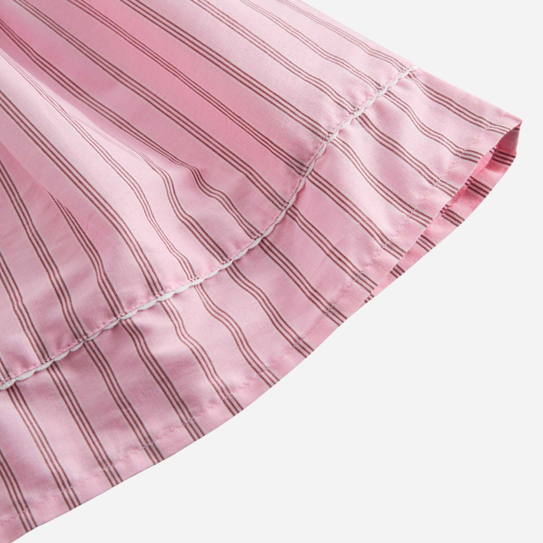 Sold at Bombon shop, designed by Mar Mar Copenhagen, Dulla baby dress in Bonbon Pink Stripes with puff sleeves