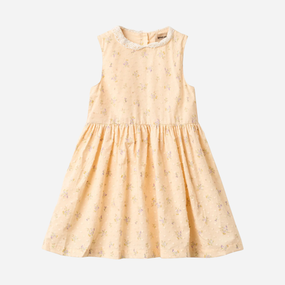 Sold at Bombon Shop, designed by Wheat, barely apricot flowers organic cotton sleeveless dress with soft gathered skirt.