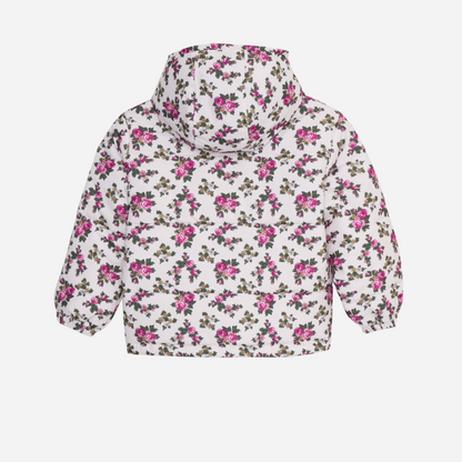 Sold at Bombon shop, this girls’ puffer jacket by The New Society features an all-over rose floral print on a cream base, complete with a hood, front pockets, and snap-button closure—combining warmth, function, and a touch of charm for cooler days. back