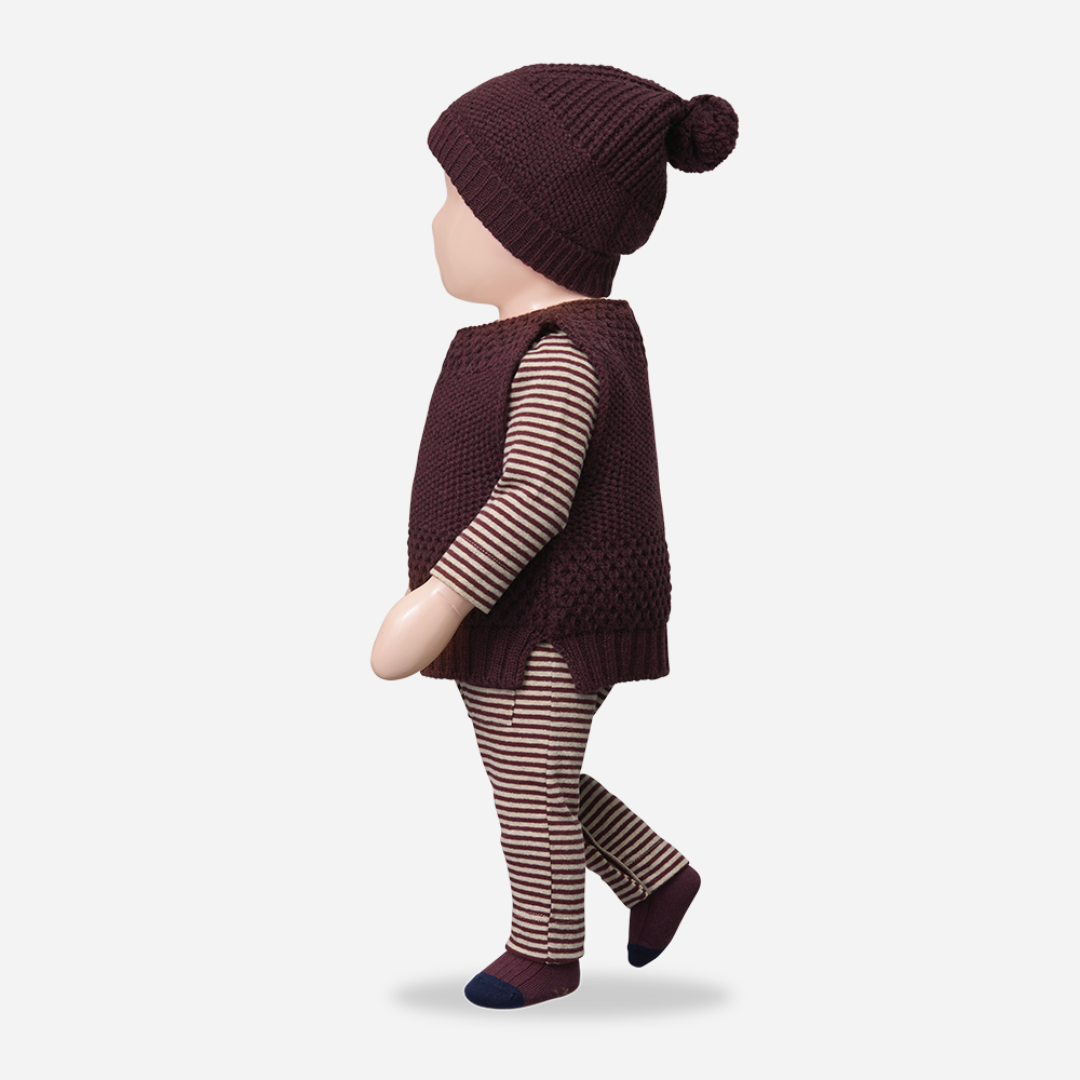 Sold at Bombon shop, designed by 1+ in the family — dark purple melanzana knit baby beanie with pom-pom and wide fold-over brim, displayed flat on a white background. mannequin
