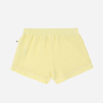 Sold at Bombon Shop, designed by 1+ in the family, lemon baby shorts with elastic waistband and soft cotton fabric.