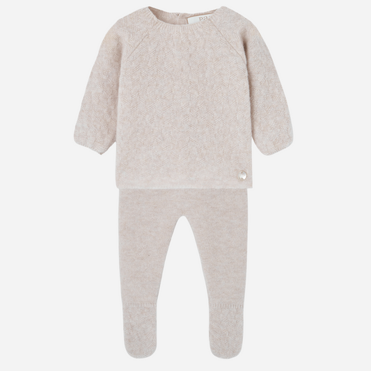 Sold at Bombon shop, designed by Paz Rodriguez. Beige baby knit two-piece set with sweater and footed pants in a soft textured pattern.