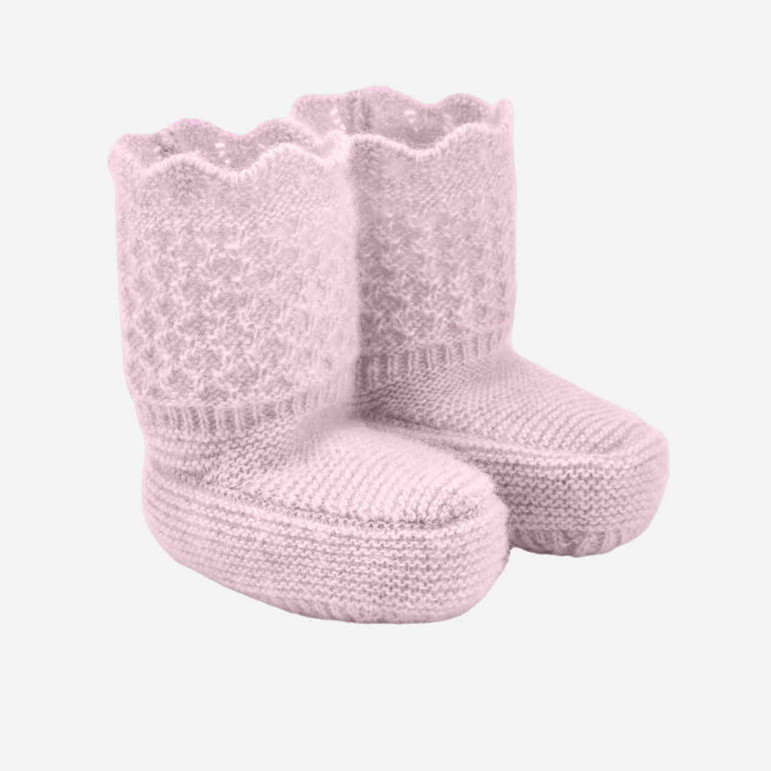 Sold at Bombon shop, designed by Paz Rodriguez, pale pink baby booties with scalloped trim