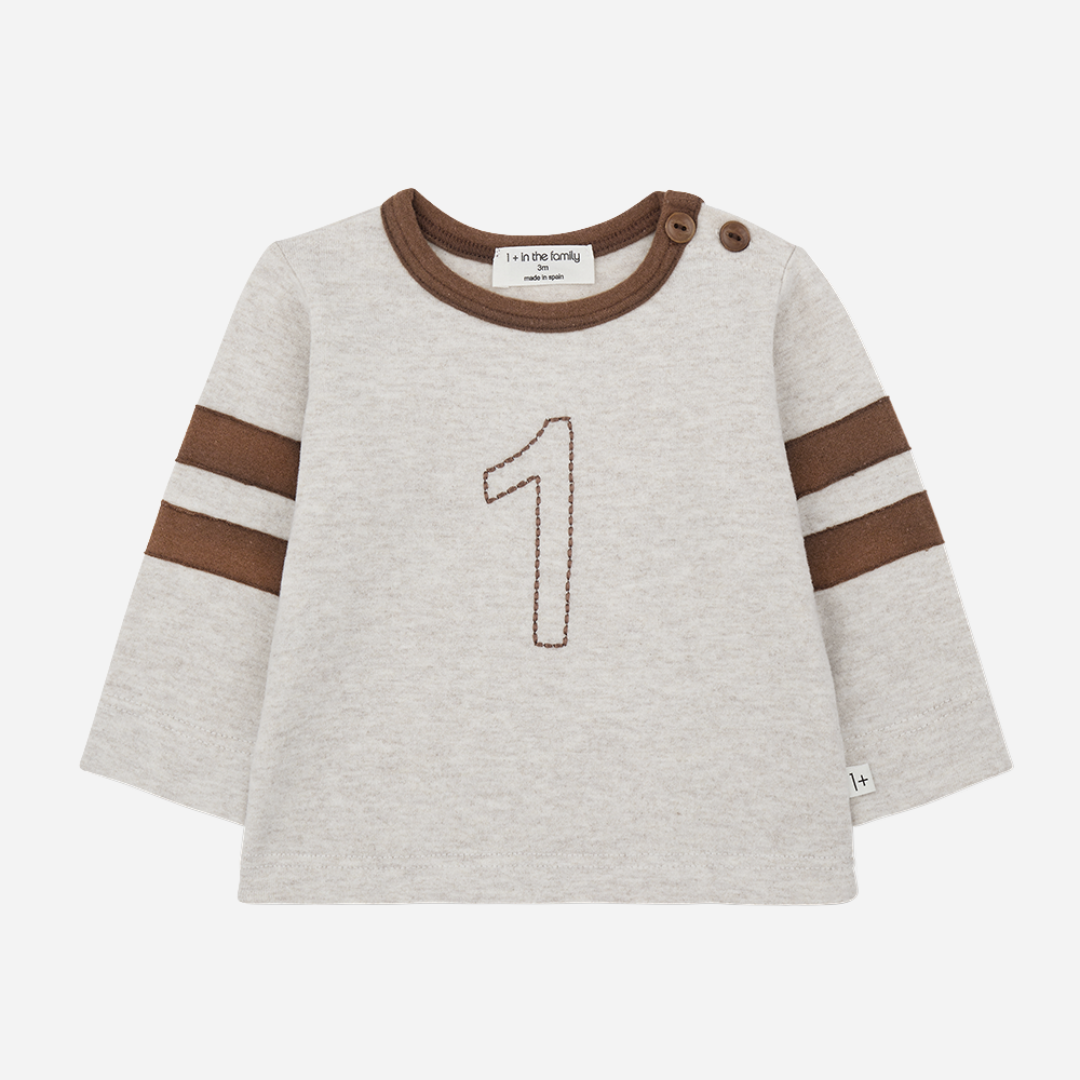 Children's sweater with brown accents and number '1' on a white background