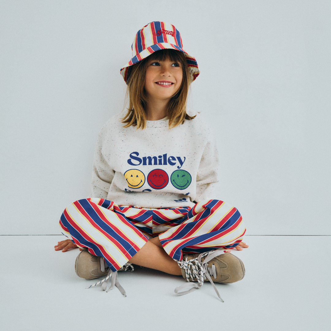 sold at Bombon, designed by The New Society kids striped pants in multicolor gorse stripes 100% cotton relaxed fit pairs with tilo t-shirt