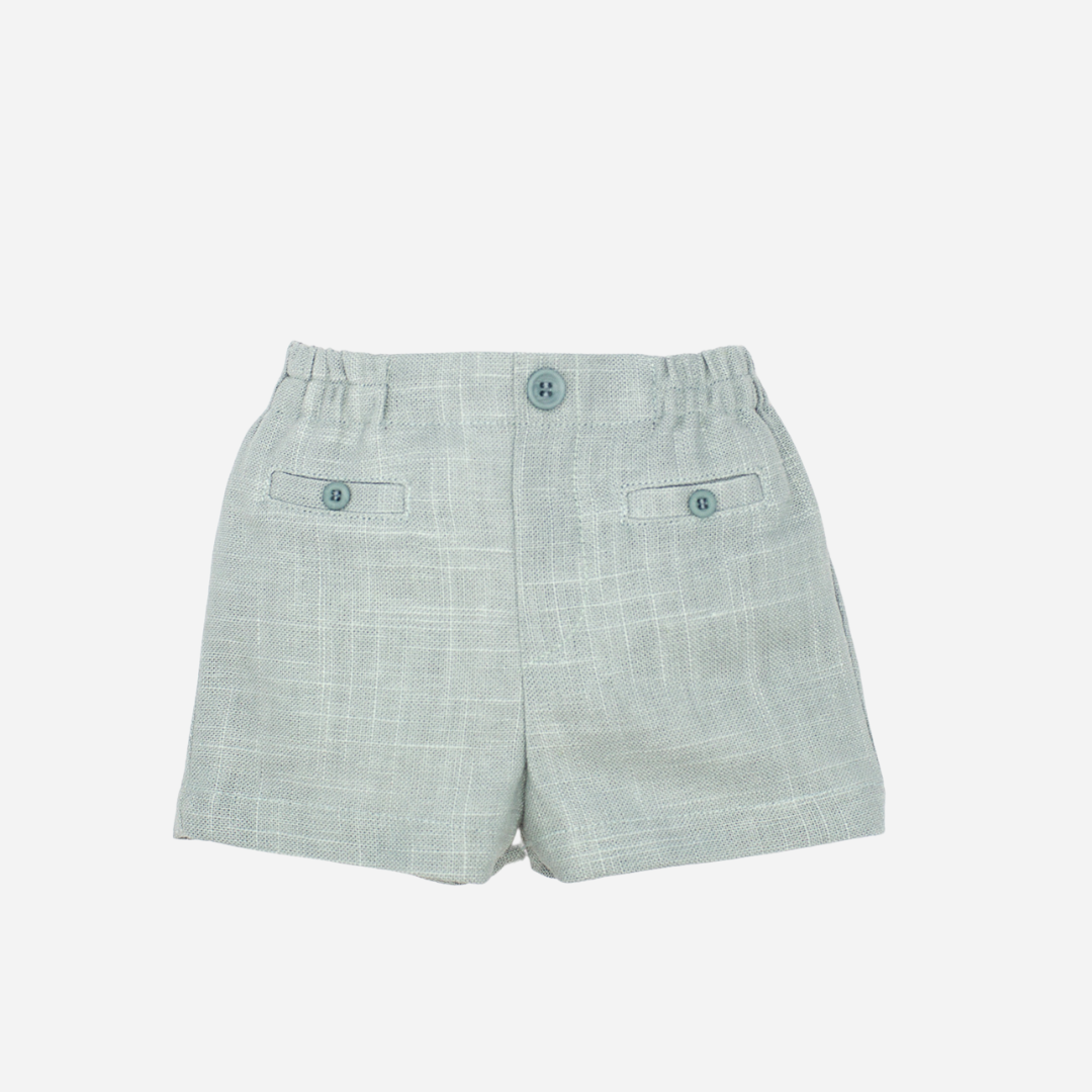 sold at Bombon shop, designed by fina ejerique brand, green linen shorts for babies and toddlers are perfect for spring and summer. front view