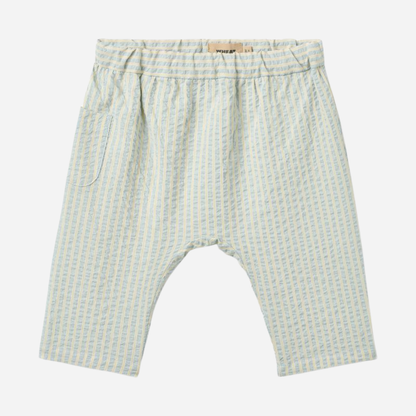 Sold at Bombon Shop, designed by Wheat, summer sky stripe organic cotton baby trousers with elastic waistband and soft blue vertical stripes.