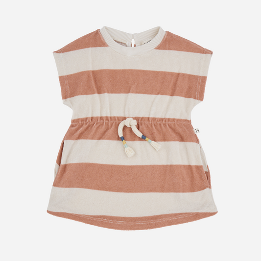 Sold at Bombon shop, designed by 1+ in the family brand, this pink and white striped dress for baby girls and toddlers is ideal for spring and summer. Front view