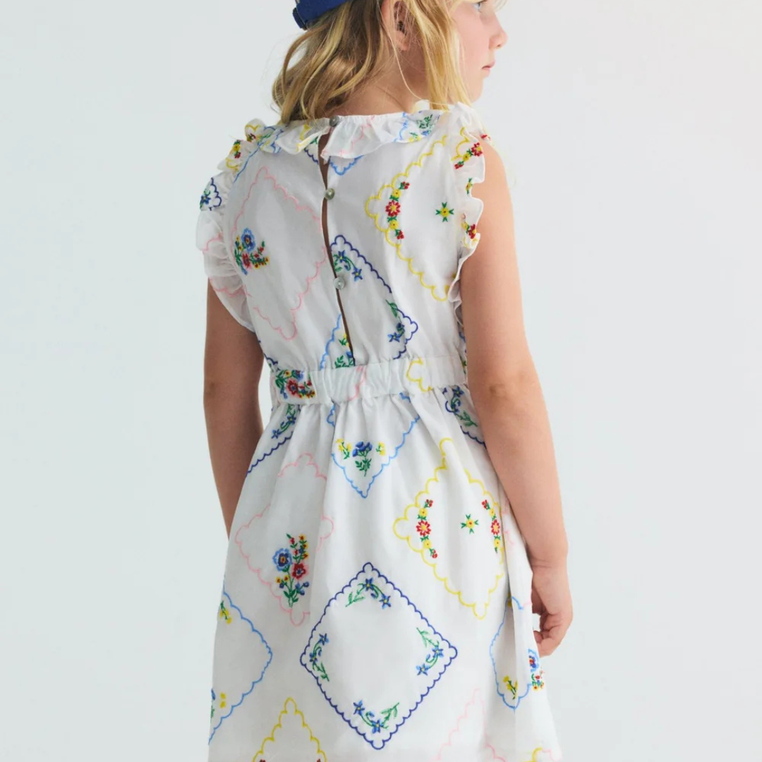 sold at Bombon, designed by The New Society girls dress with multicolor floral embroidery in 100% cotton sleeveless silhouette matching sibling outfit