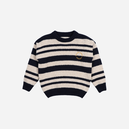 Sold at Bombon shop, this kids' sweater by The New Society features classic navy and beige stripes in a soft knit fabric, with a round neckline, ribbed trims, and gold embroidered detail on the chest for a cozy and stylish everyday layer. front