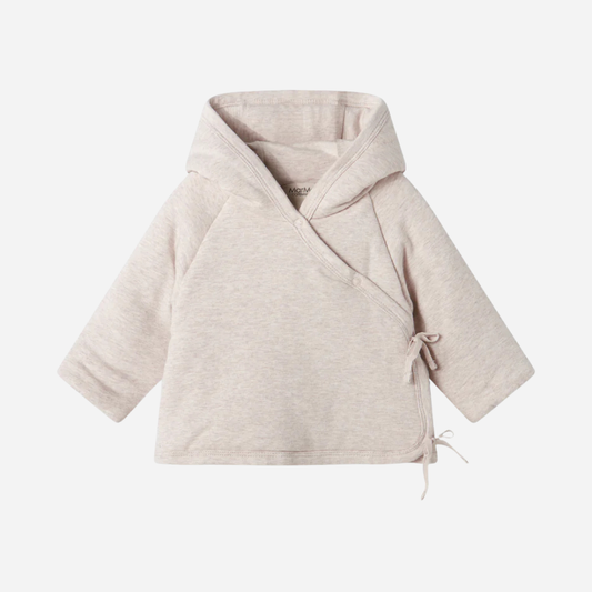 Sold at Bombon shop, designed by MarMar Copenhagen — beige organic cotton baby jacket with hood and side tie closure.